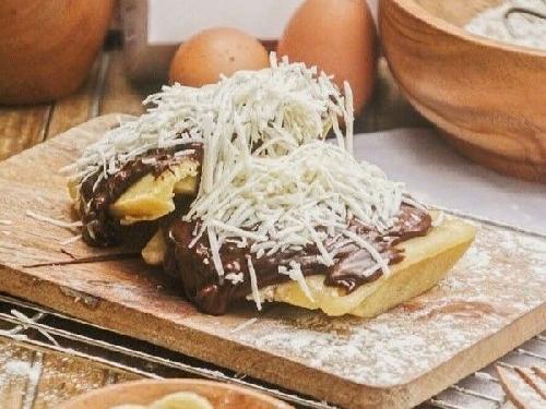 Cappuccino coffee cup with frothy milk foam